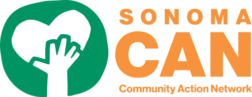 Logo of Sonoma CAN (Community Action Network). A black hand is raised and holding a heart against a green background on the left. The words "Sonoma CAN" are prominently displayed in orange letters to the right, with "Community Action Network" in smaller text below.